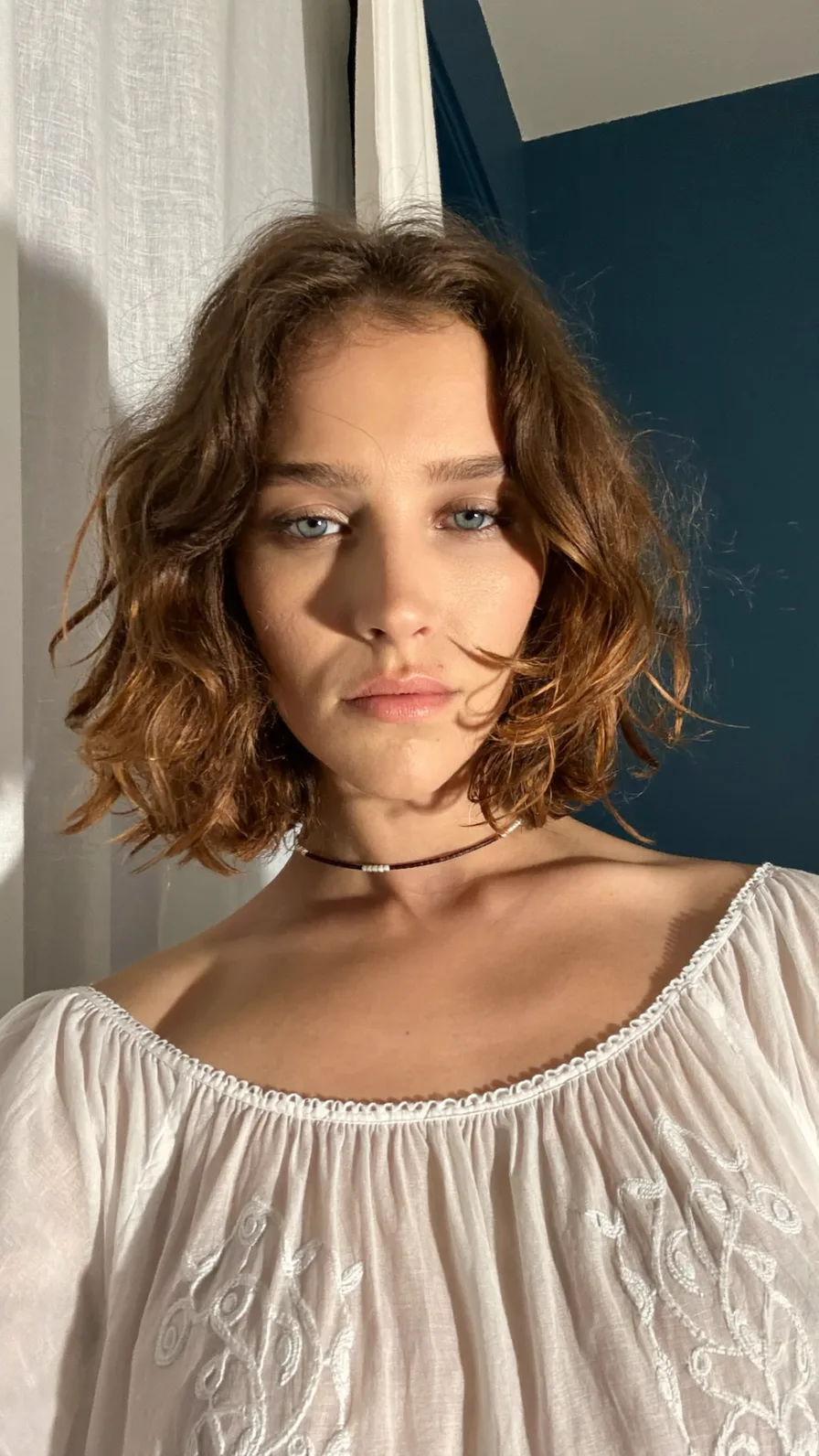 Textured Chin-Length Choppy Bob with Curtain Bangs