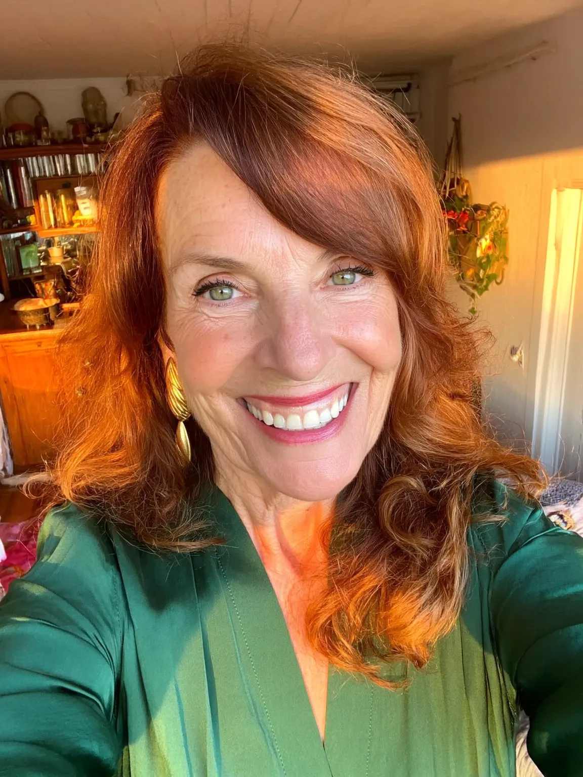 Long Wavy Auburn Layers with Side-Swept Bangs