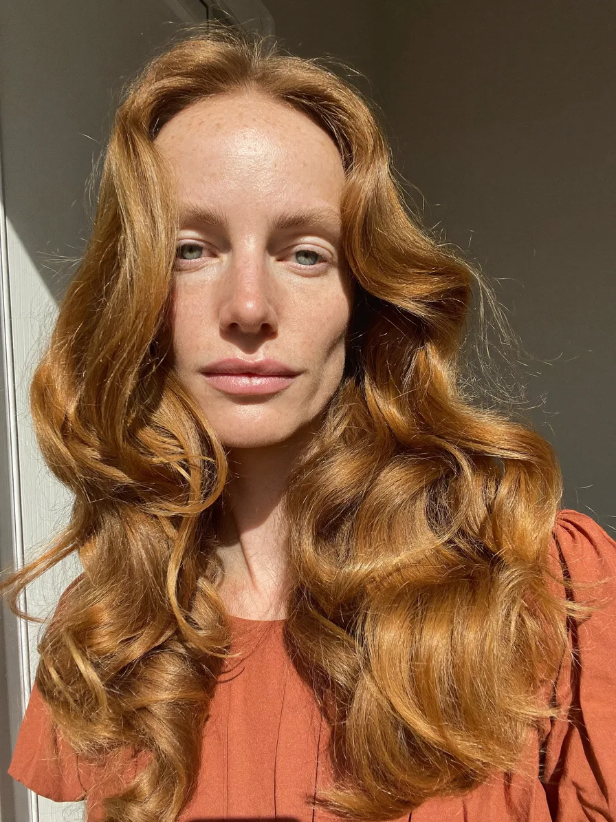 Voluminous Long Layers with Flowing Center-Parted Auburn Waves