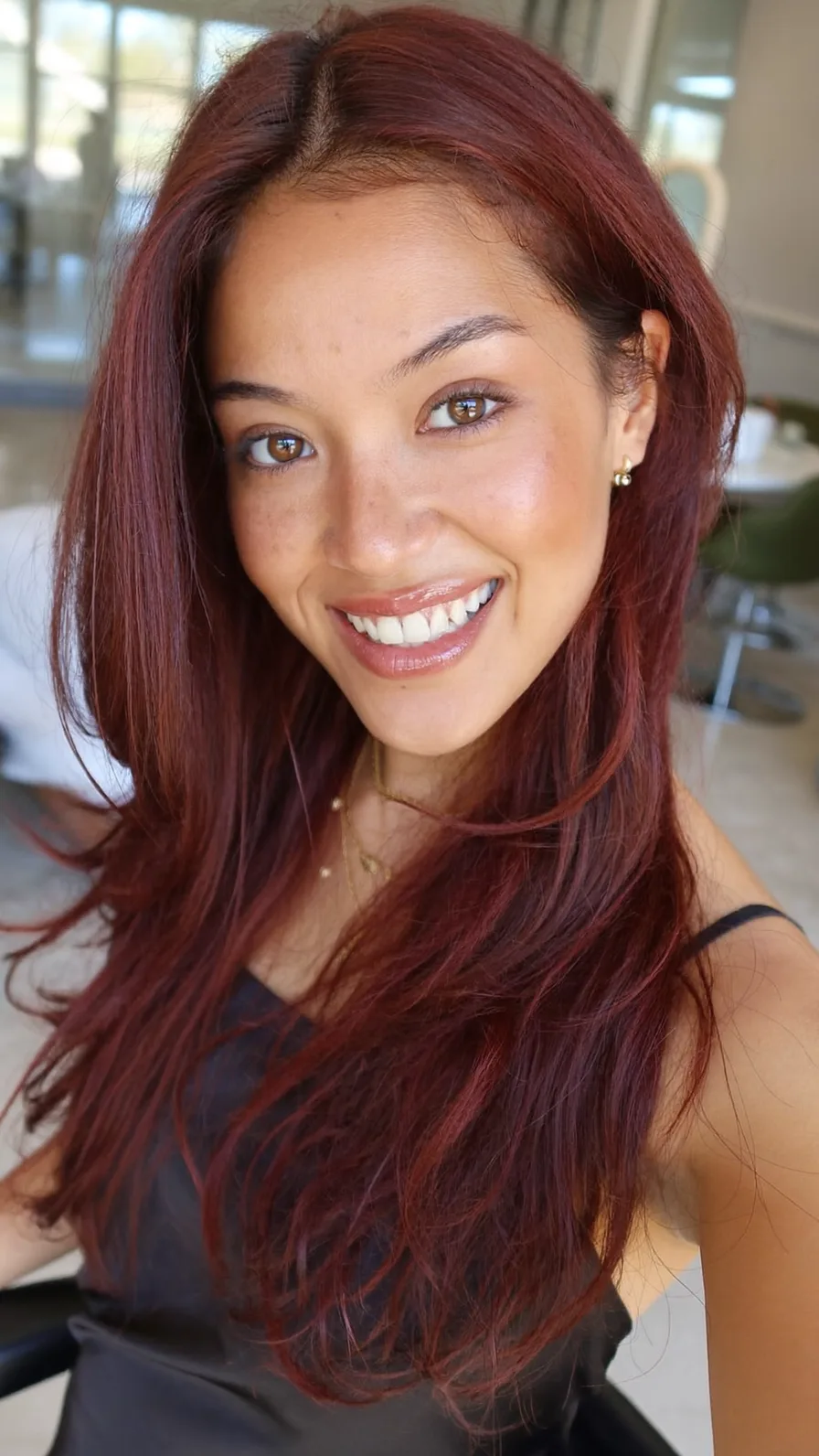 Elegant Long Auburn Hair with Center Part and Flowing Layers