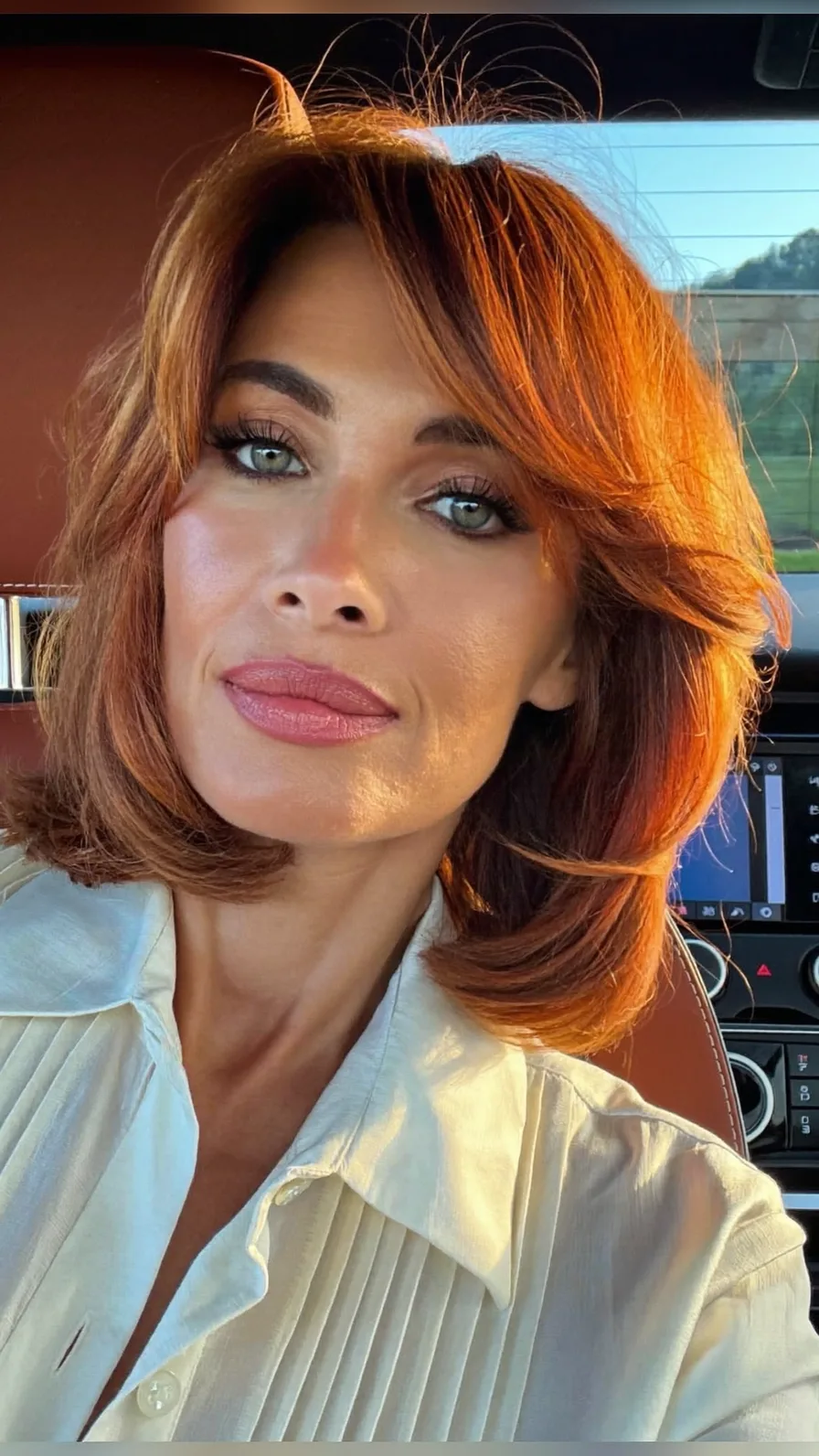 Classic Shoulder-Length Copper Auburn Feathered Layer Hairstyle