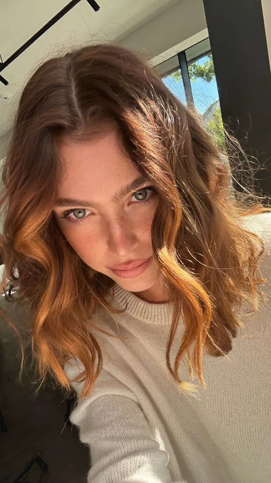 Warm Copper Wavy Lob with Soft Curtain Bangs