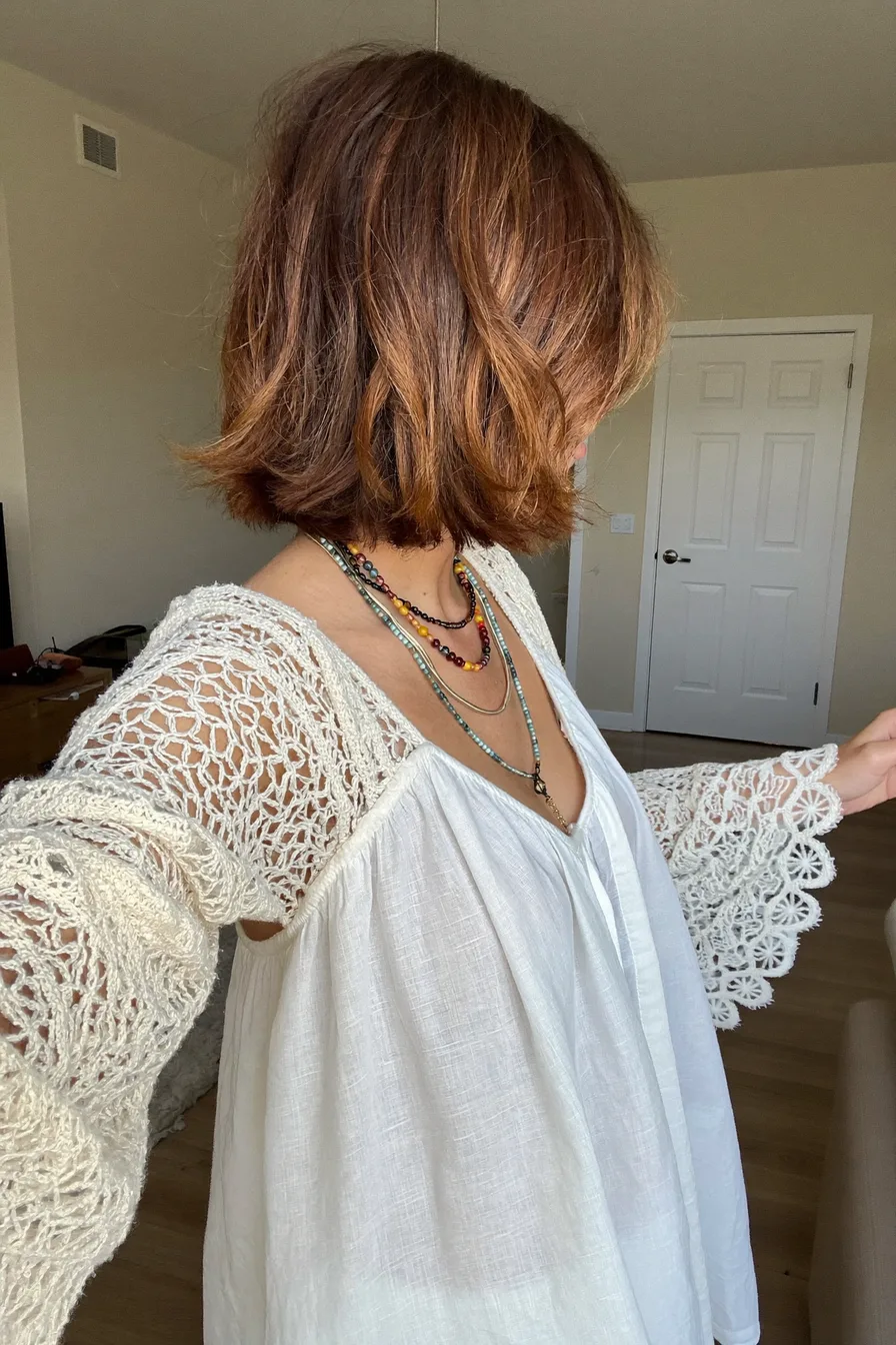 Textured Chin-Length Bob with Warm Balayage Highlights