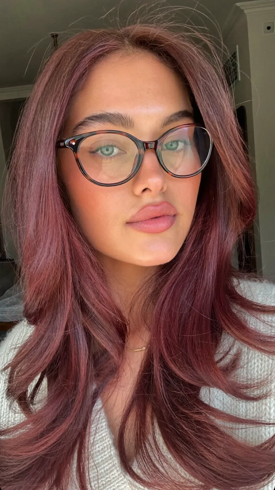 Voluminous Auburn Layered Cut with Soft Flowing Flicked Ends