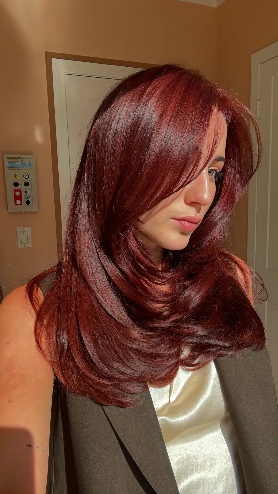 Voluminous Rich Auburn Medium-Length Long Layered Blowout