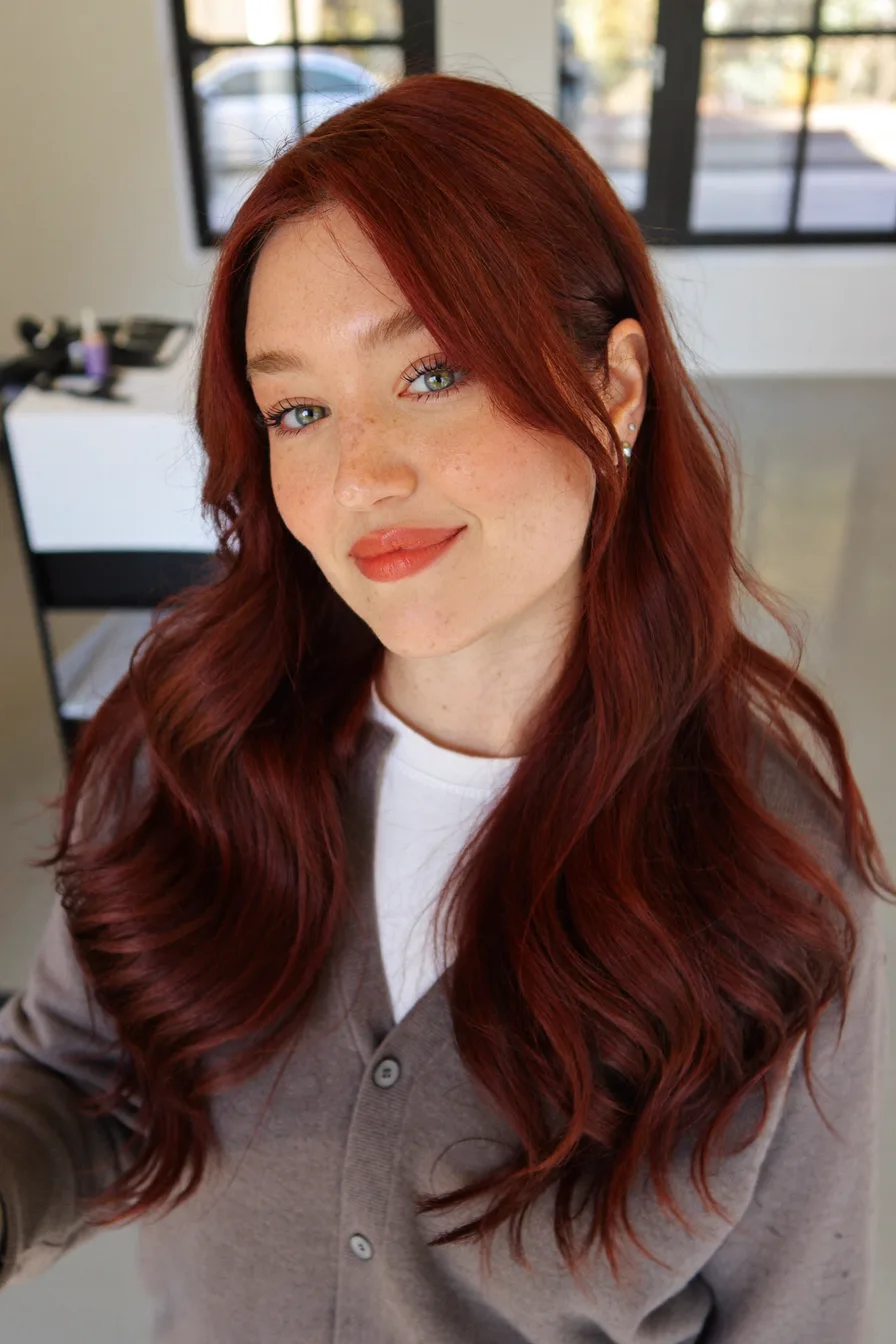 Soft Flowing Long Auburn Hair with Curtain Bangs