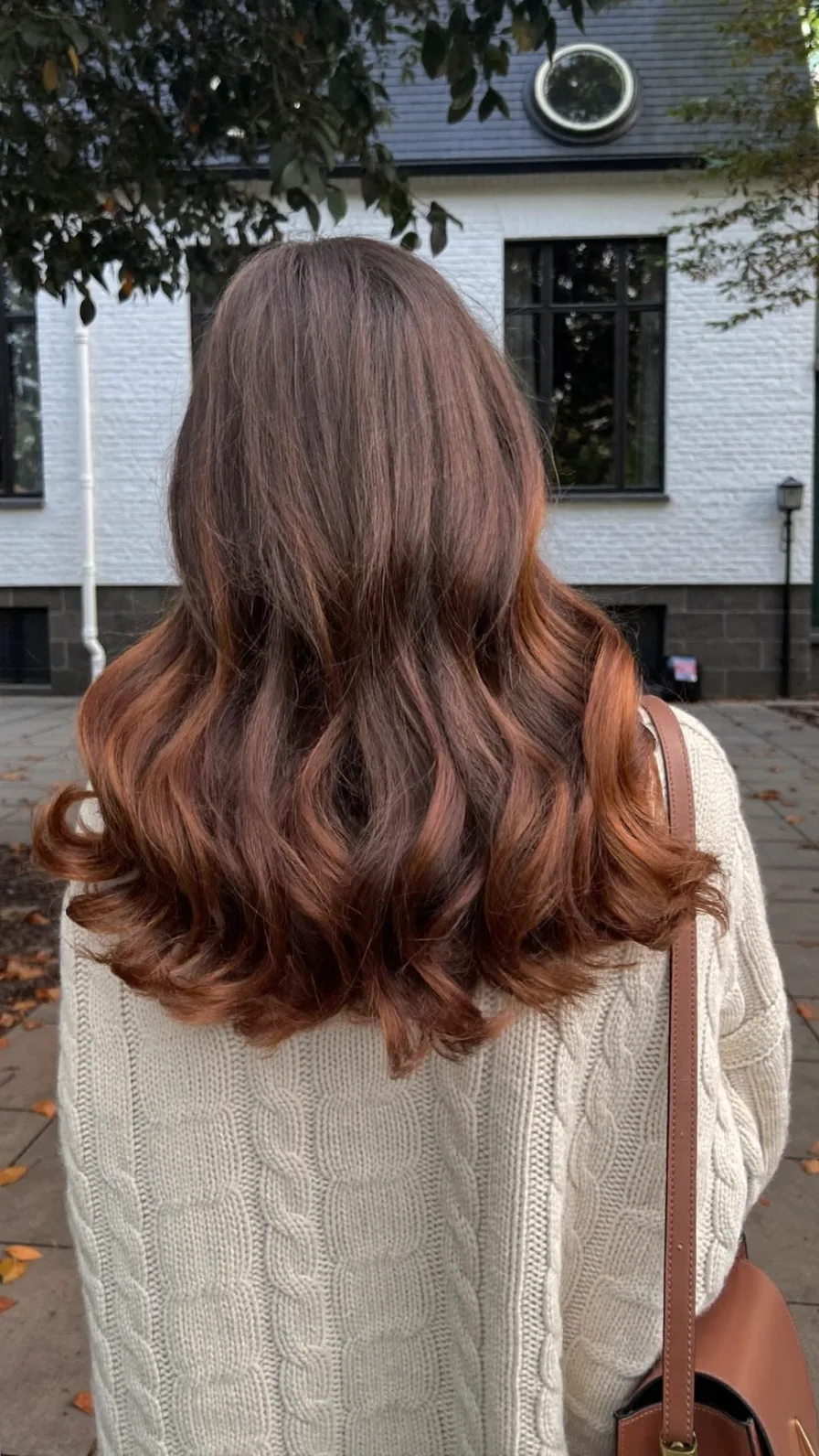 Warm Chestnut Wavy Medium-Length Hair with Long Layers