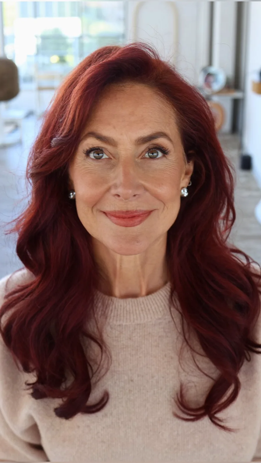 Soft Auburn Long Layers with Side-Swept Volume Wave