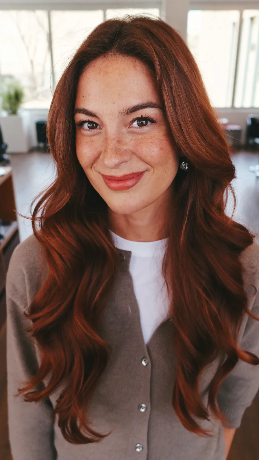 Rich Auburn Long Layers with Center Part and Rounded Ends