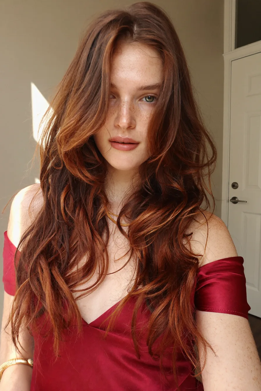 Voluminous Auburn Long Layers with Flowing Curtain Bangs