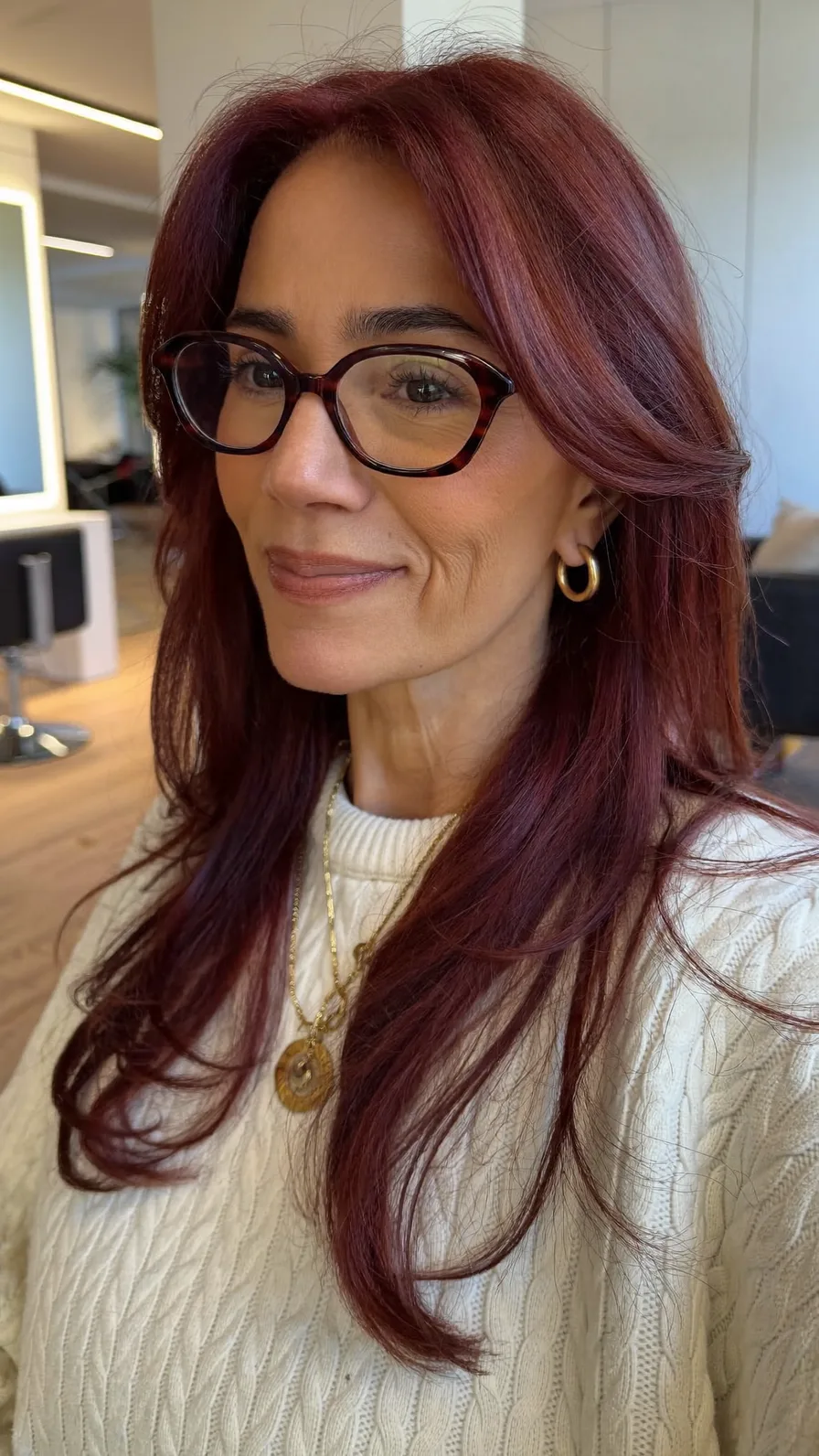 Elegant Long Auburn Layers with Flowing Curtain Bangs