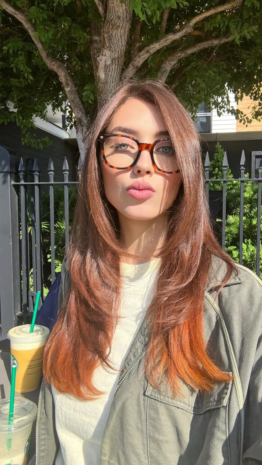 Elegant Long Layered Hairstyle with Rounded Ends and Side Part