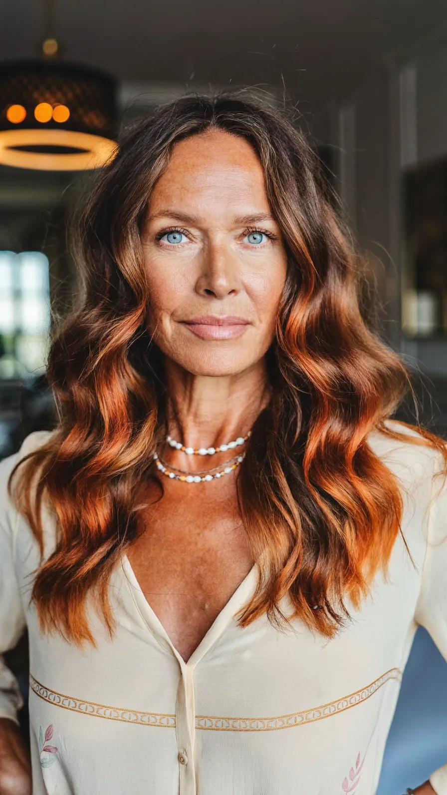 Long Auburn Wavy Hair with Subtle Copper Balayage Highlights