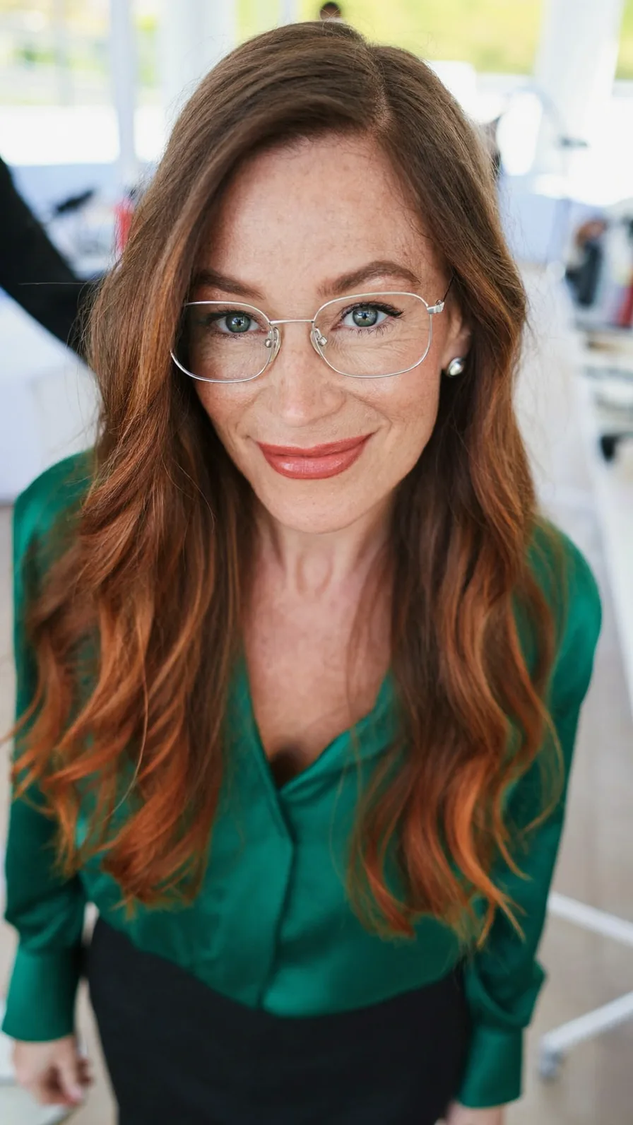 Soft Flowing Auburn Long Layers with Subtle Side-Swept Bangs