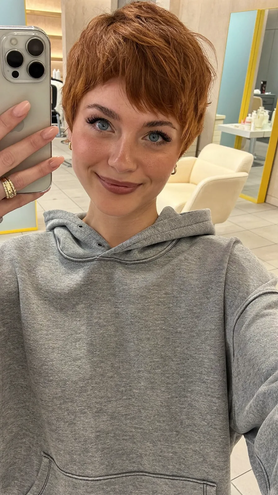 Textured Copper Pixie with Side-Swept Bangs for Oval Faces