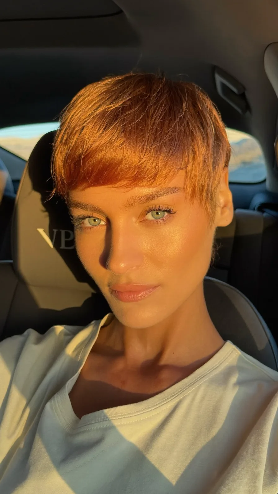 Modern Textured Pixie Cut with Warm Copper Auburn Color