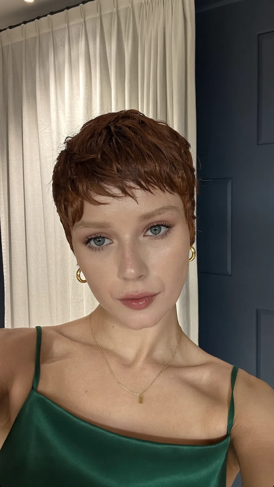 Textured Auburn Pixie with Edgy Micro Bangs and Choppy Layers