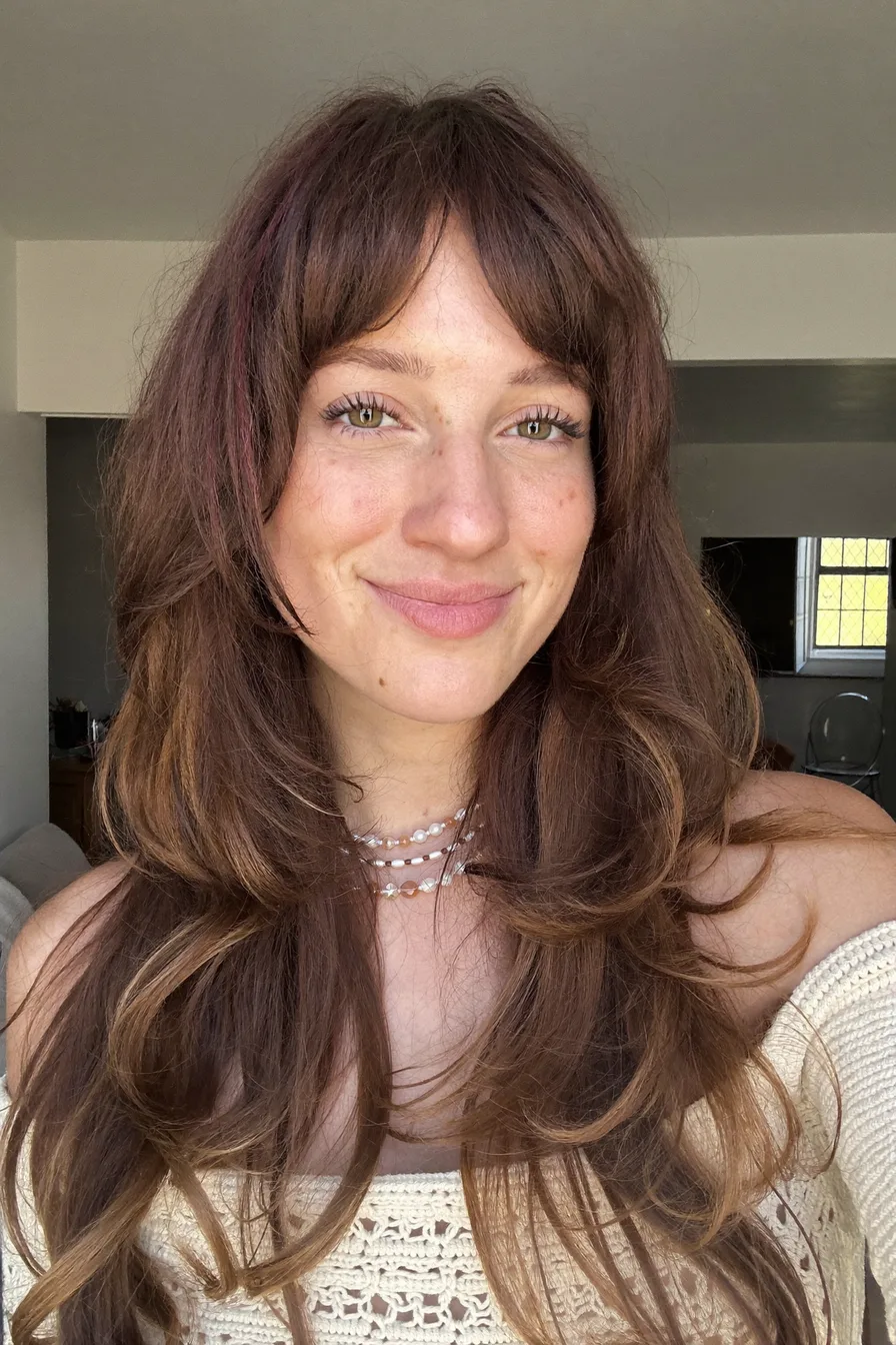 Effortless Long Auburn Red Layers with Soft Curtain Bangs