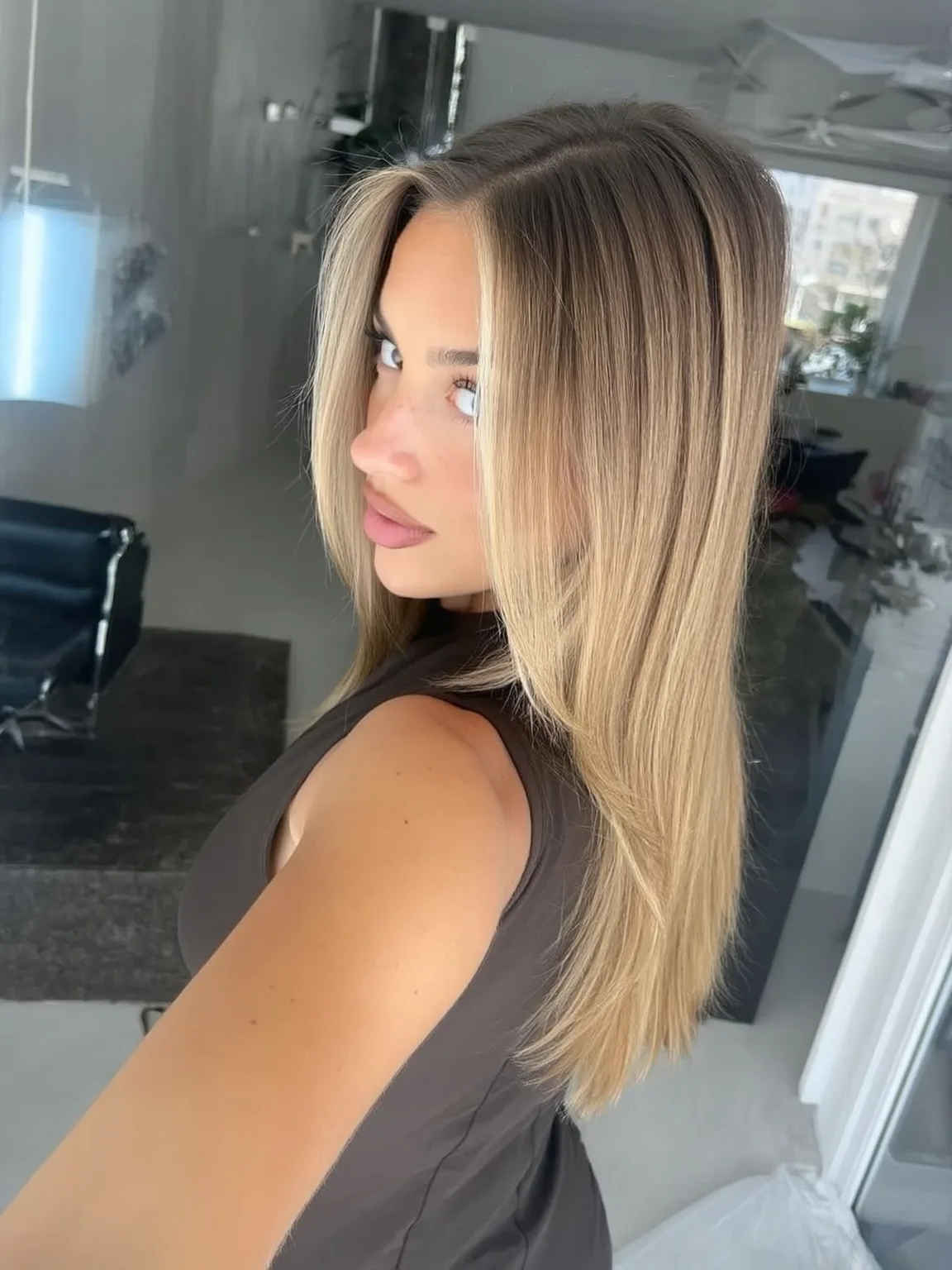 Long Straight Sandy Blonde Layers Without Bangs