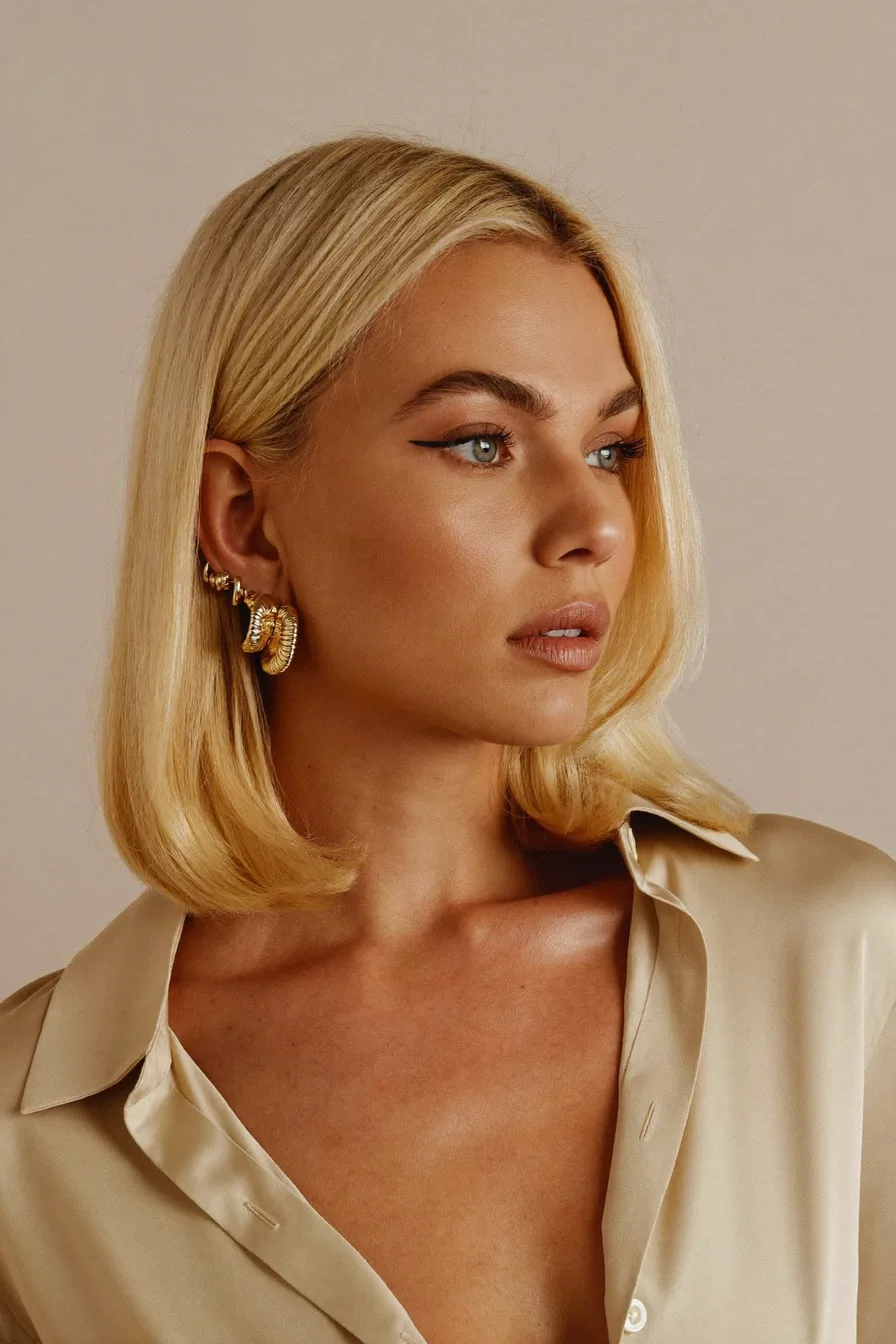 Sleek Honey Blonde Classic Bob with Middle Part