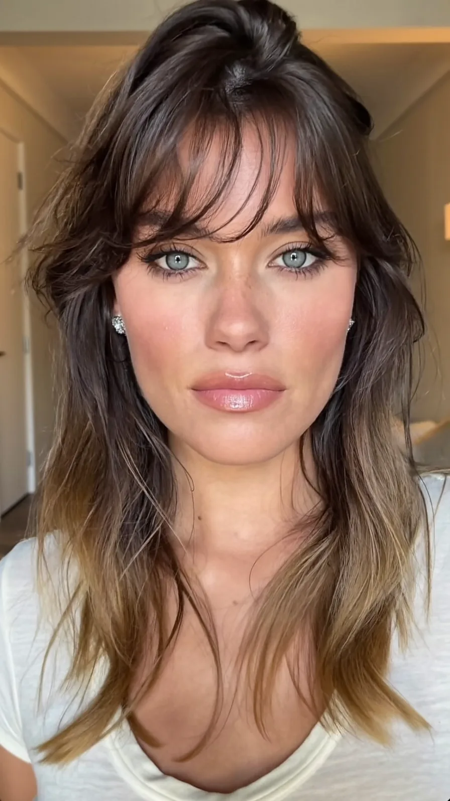 Textured Long Layers with Soft Curtain Bangs Balayage Finish