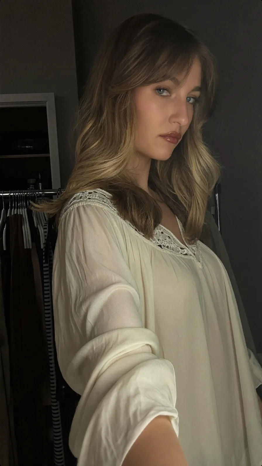 Medium Length Layered Hair with Soft Balayage and Curtain Bangs