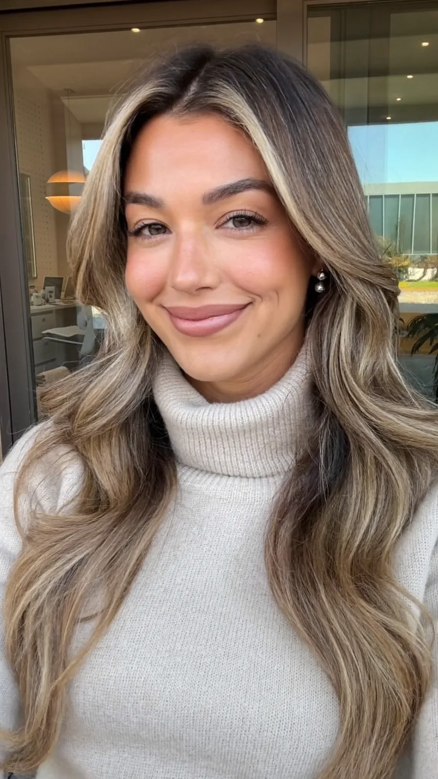 Long Layered Waves with Center Curtain Balayage Highlights