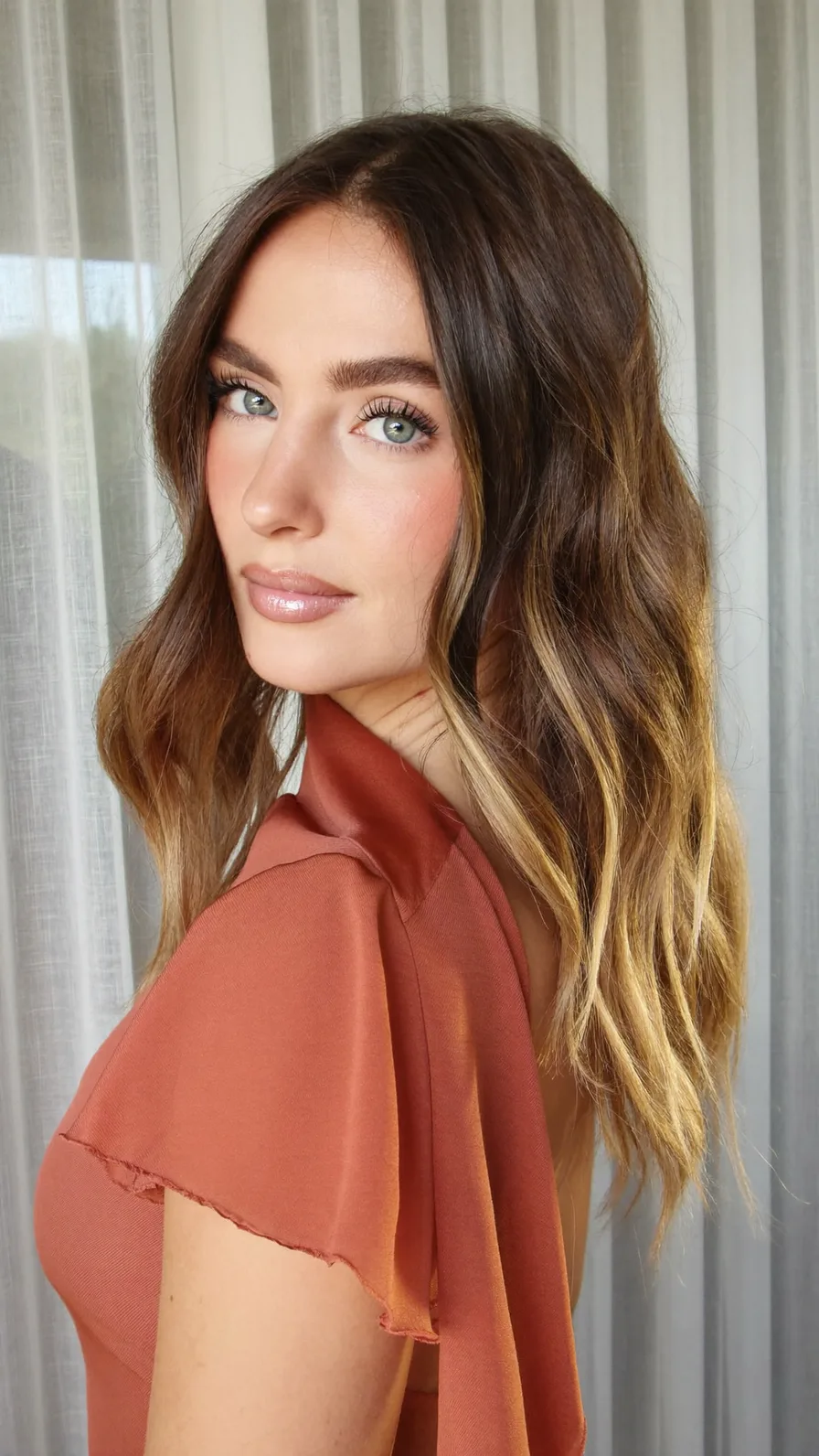 Sun-Kissed Balayage Shoulder-Length Wavy Layers Hairstyle