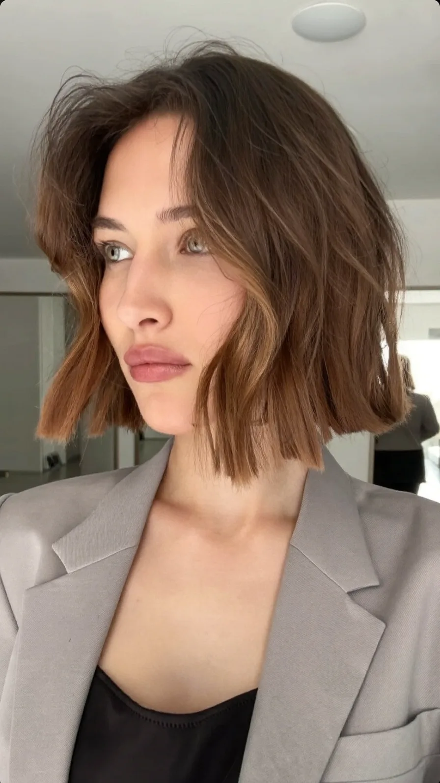 Chic Textured Blunt Bob with Subtle Curtain Bangs