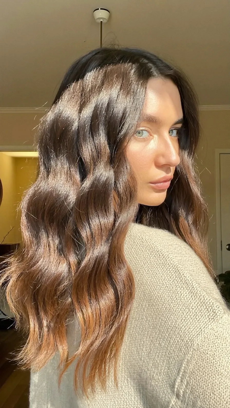 Glossy Long Wavy Layers with Warm Caramel Balayage