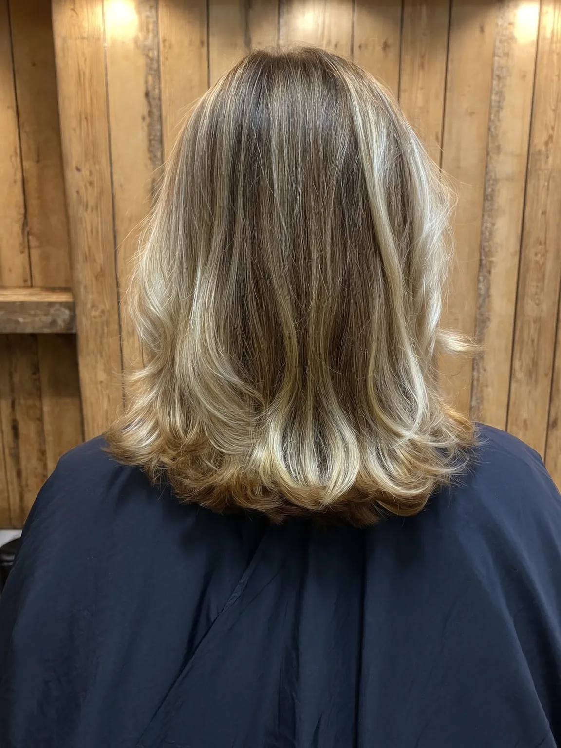 Medium-Volume Honey Blonde Layered Waves Without Bangs