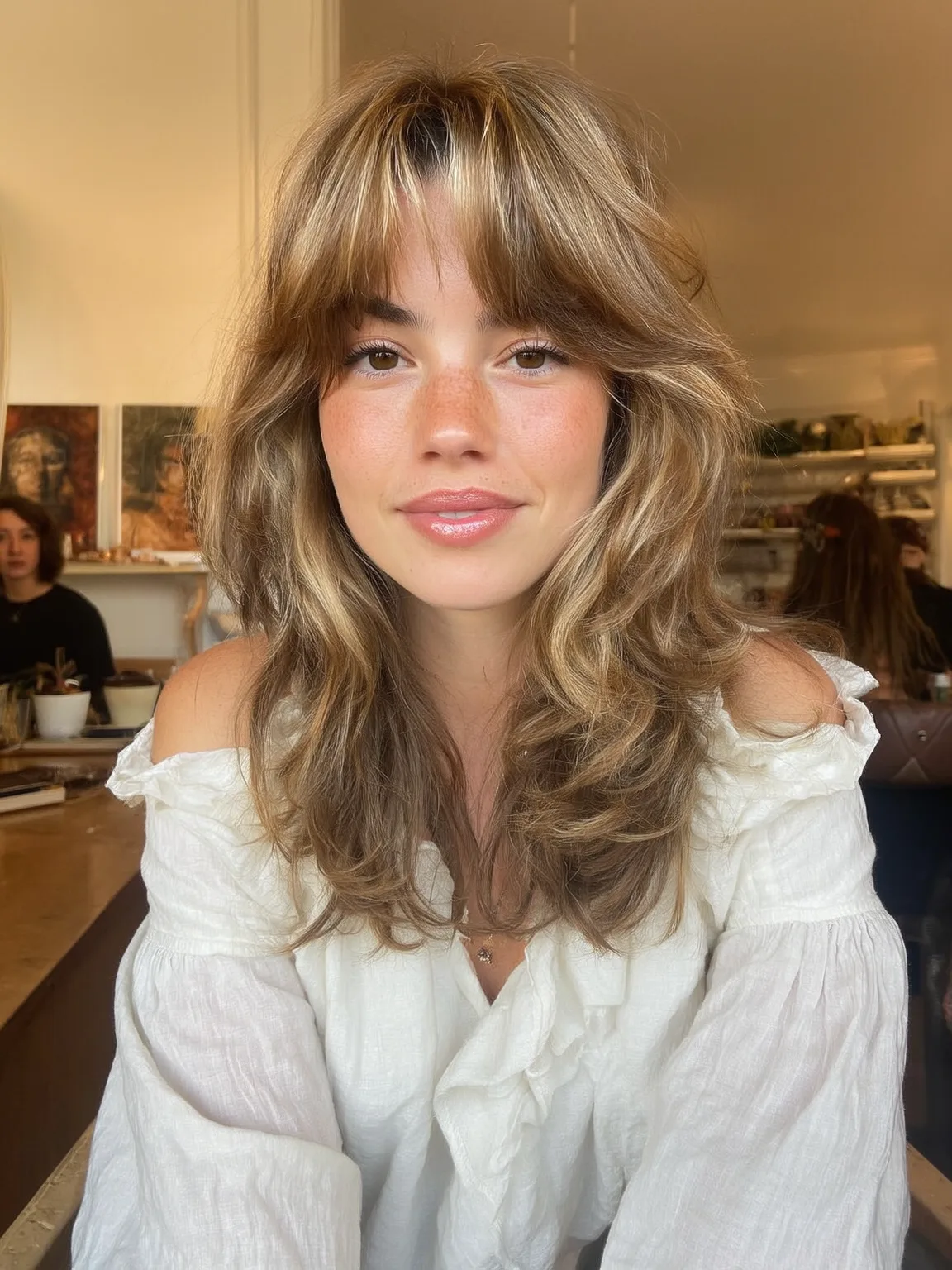 Voluminous Golden Blonde Shag with Honey Balayage