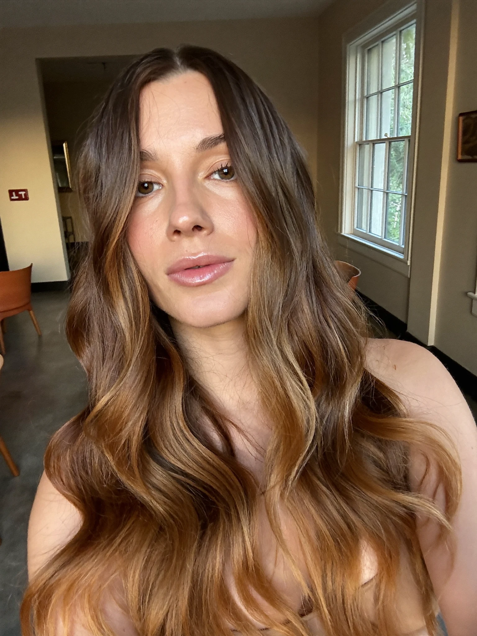 Longer Lob with Subtle Balayage and Parted Curtain Bangs