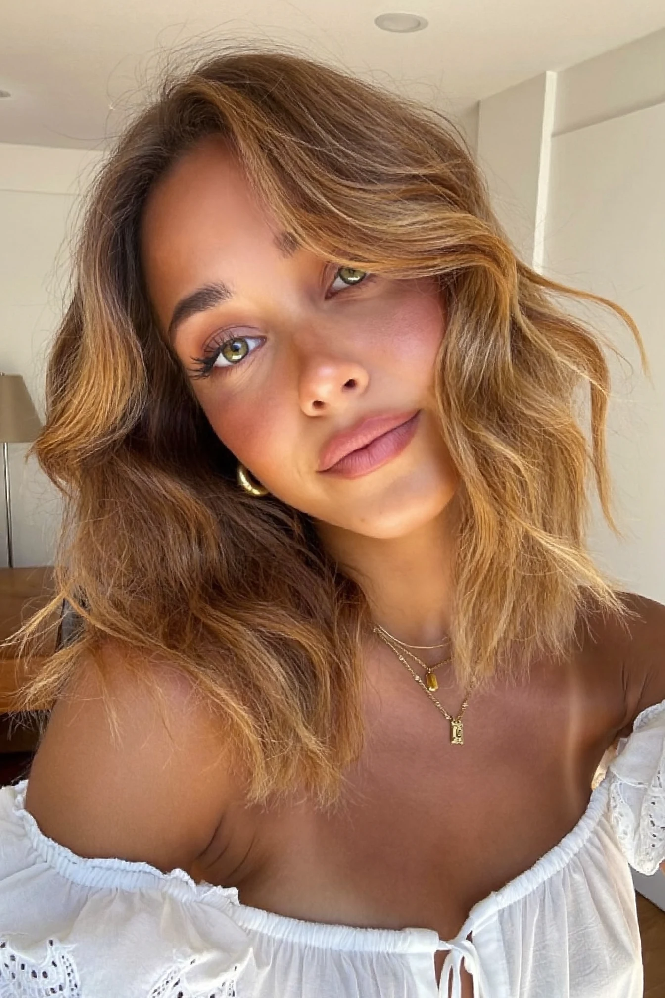 Beachy Caramel Brown With Curtain Bangs: What To Ask Your Stylist For