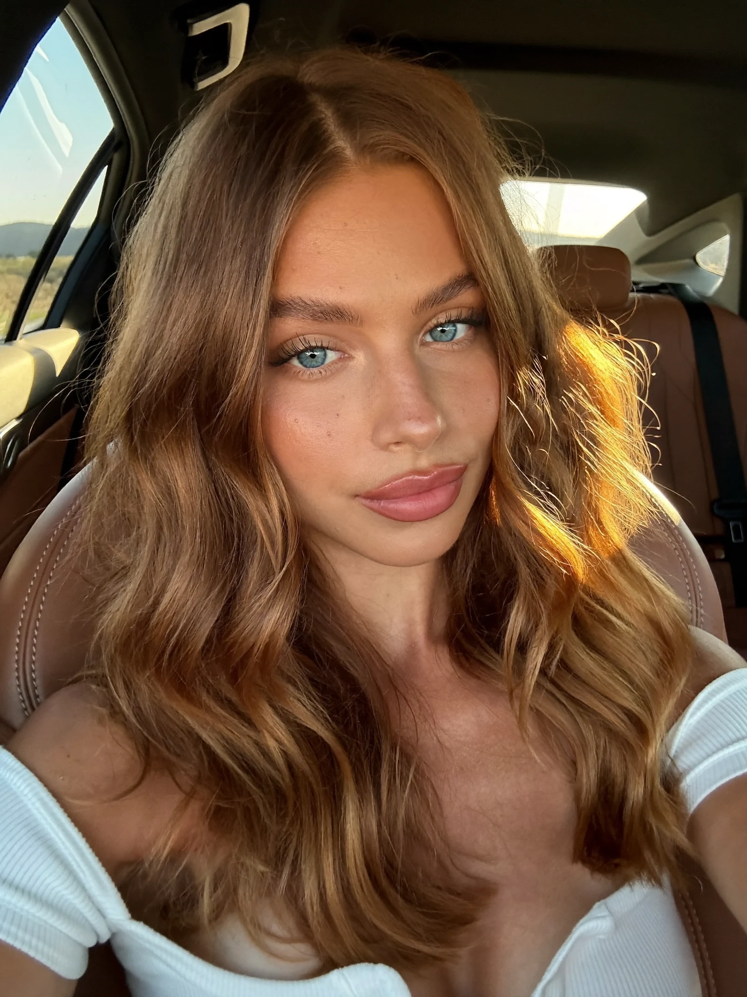 Bronde Collarbone Lob with Defined Beachy Waves