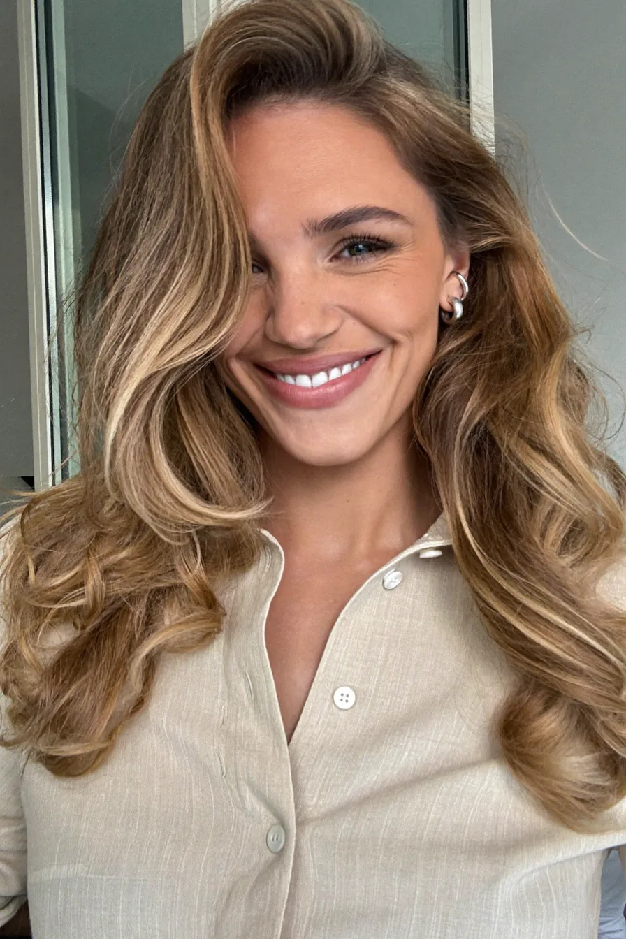 Voluminous Honey Blonde Wavy Long Layered Haircut for Effortless Glam