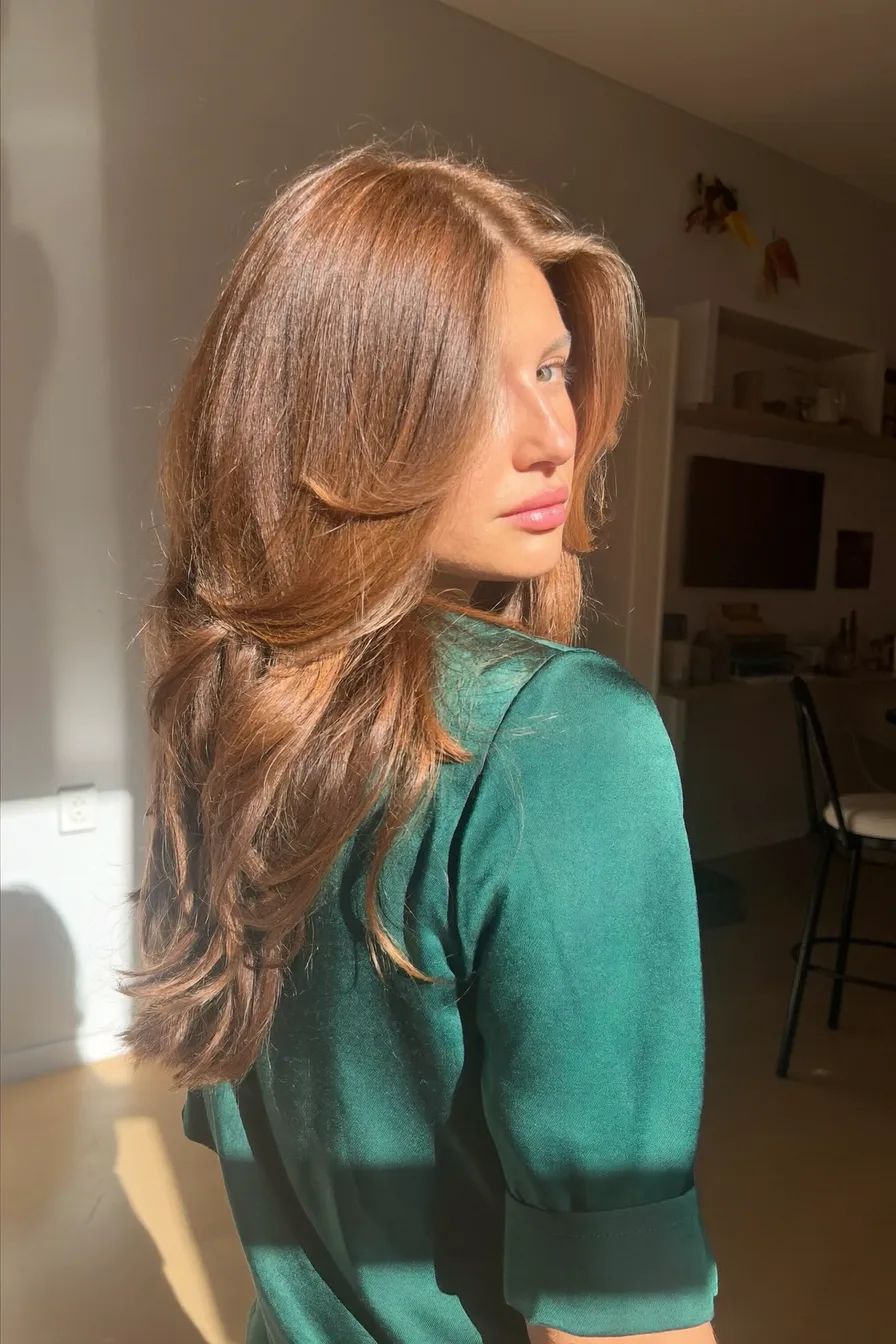 Glossy Brunette Wavy Long Layered Hair with Face-Framing Layers
