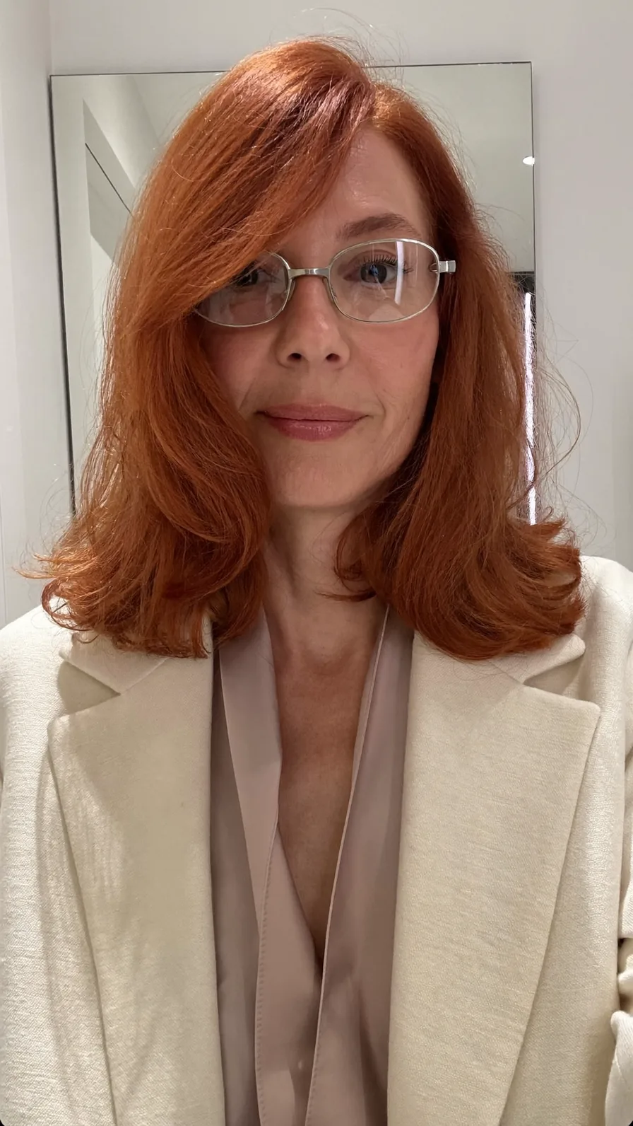 Classic Shoulder-Length Auburn Hair with Side-Swept Layers