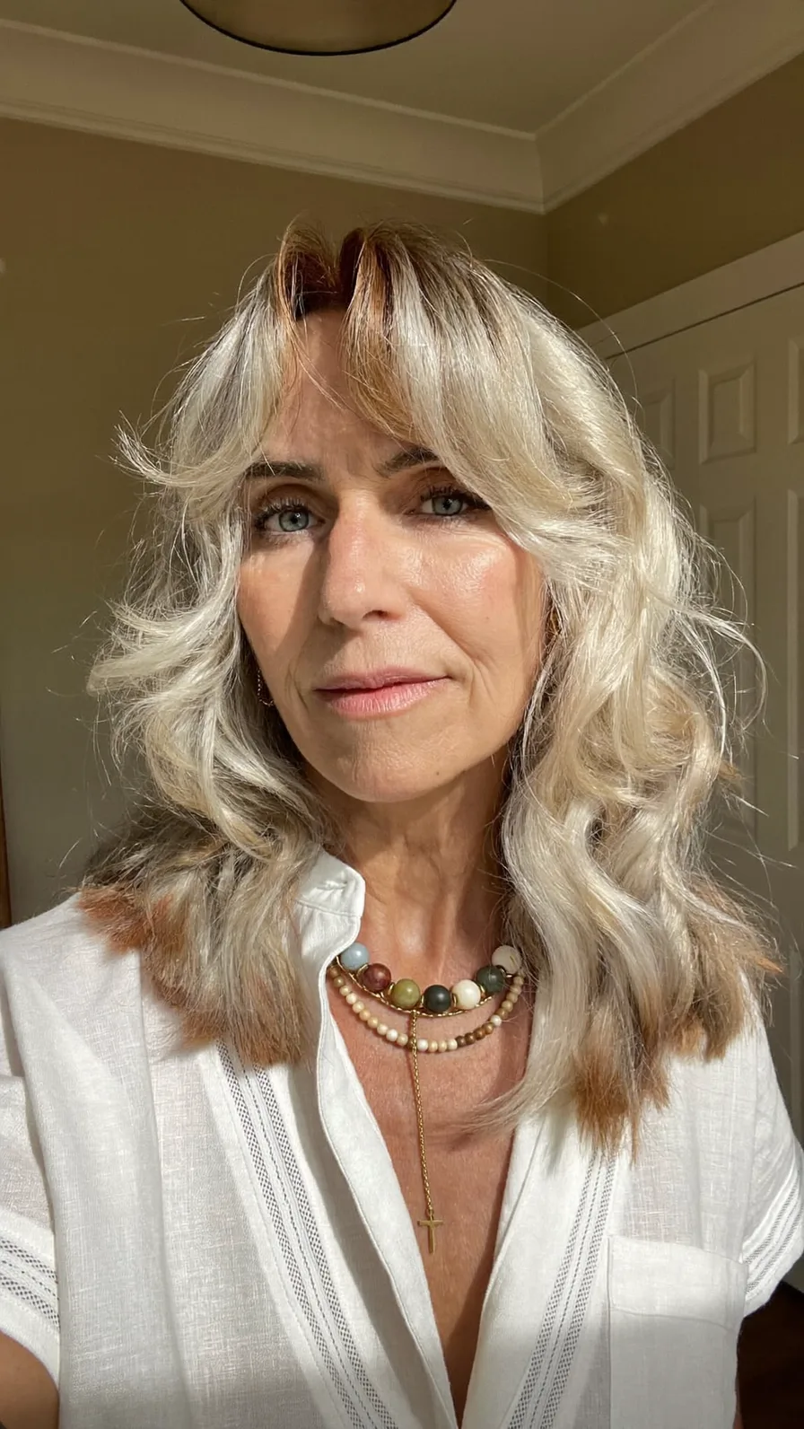 Soft Flowing Medium-Length Hair with Feathered Curtain Bangs