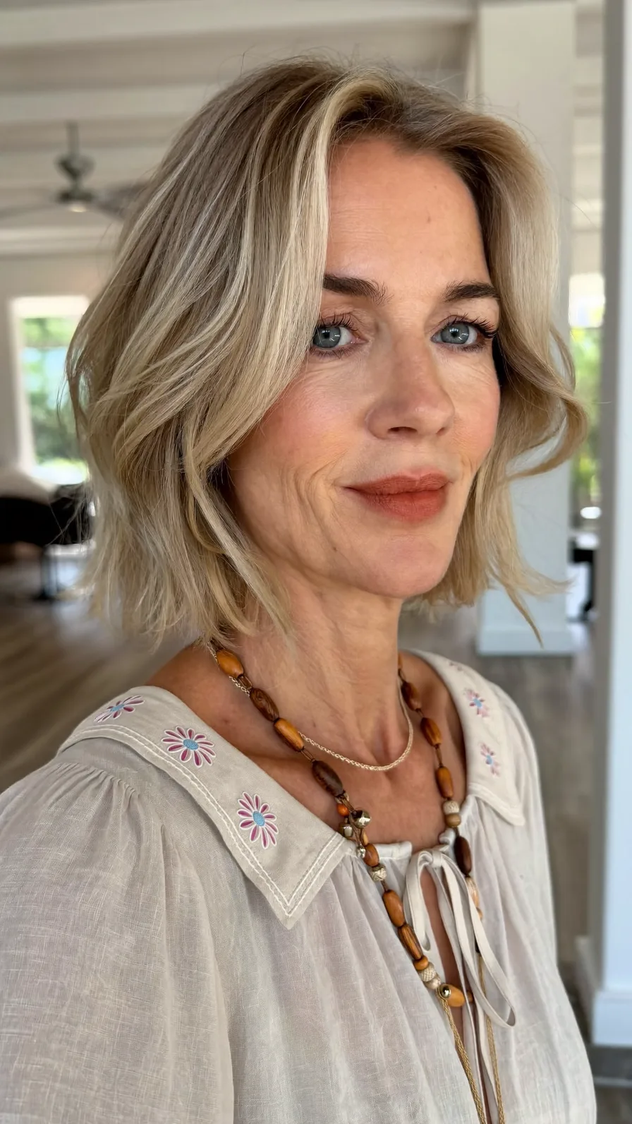 Soft Layered Chin-Length Lob with Curtain Bangs and Balayage