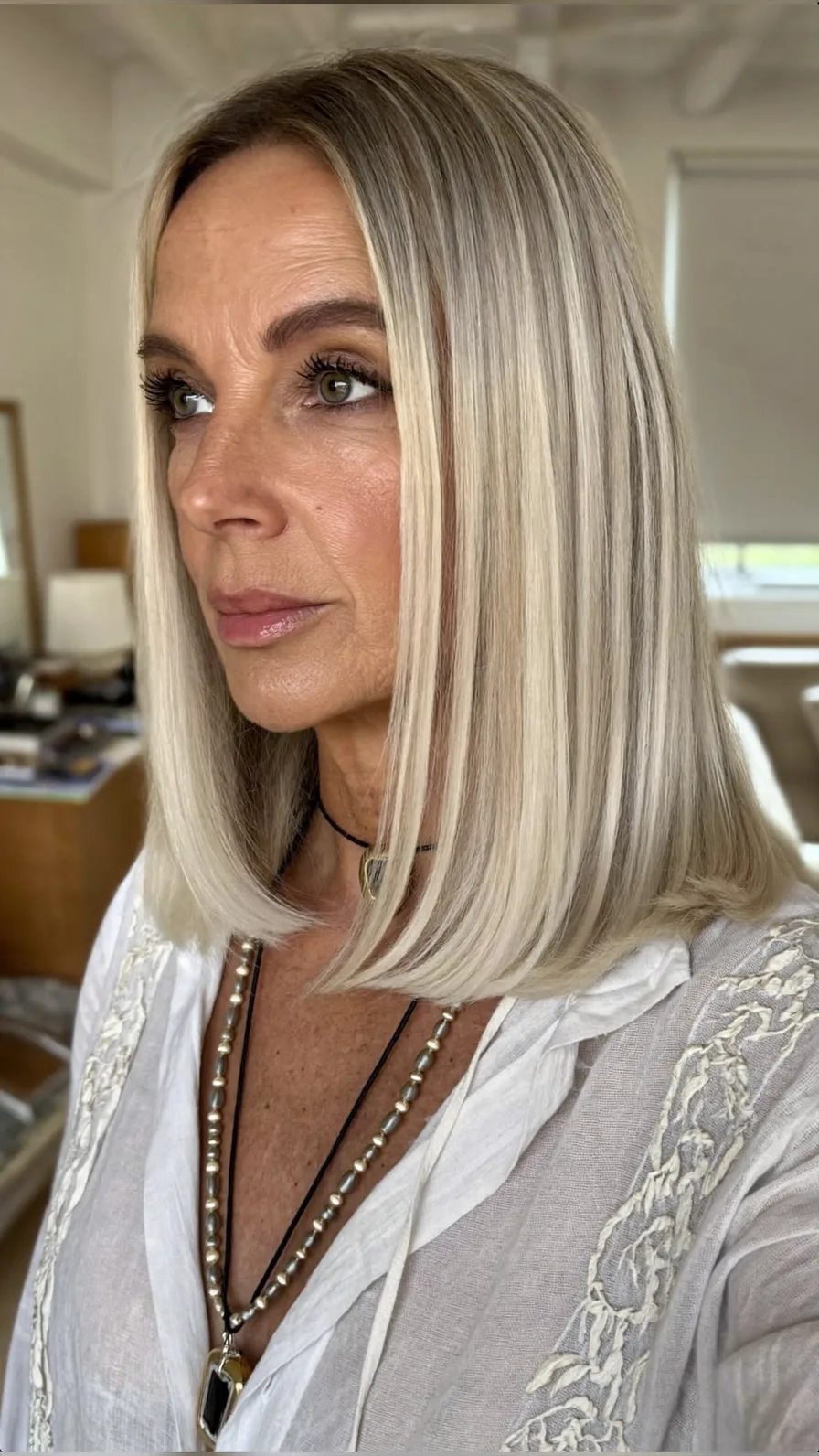 Sleek Shoulder-Length Blunt Cut for Mature Women