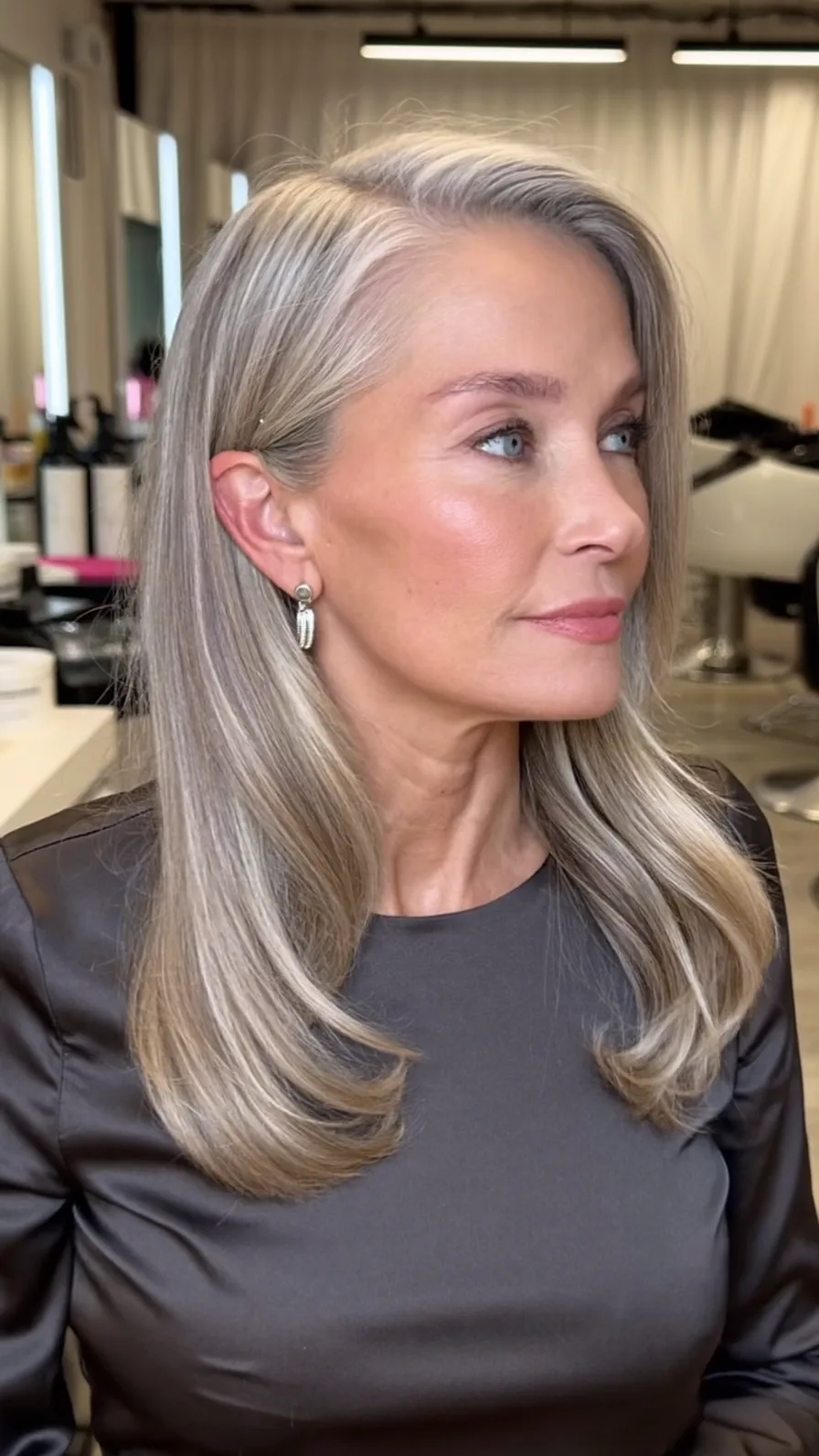 Elegant Shoulder-Length Silver Blonde Long Layered Cut