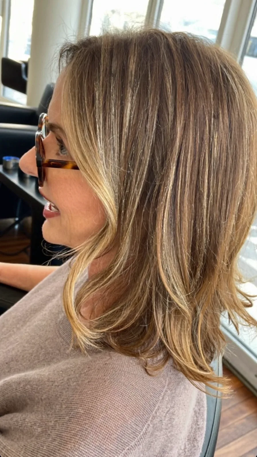 Soft Shoulder-Length Honey Blonde Waves with Flicked Ends