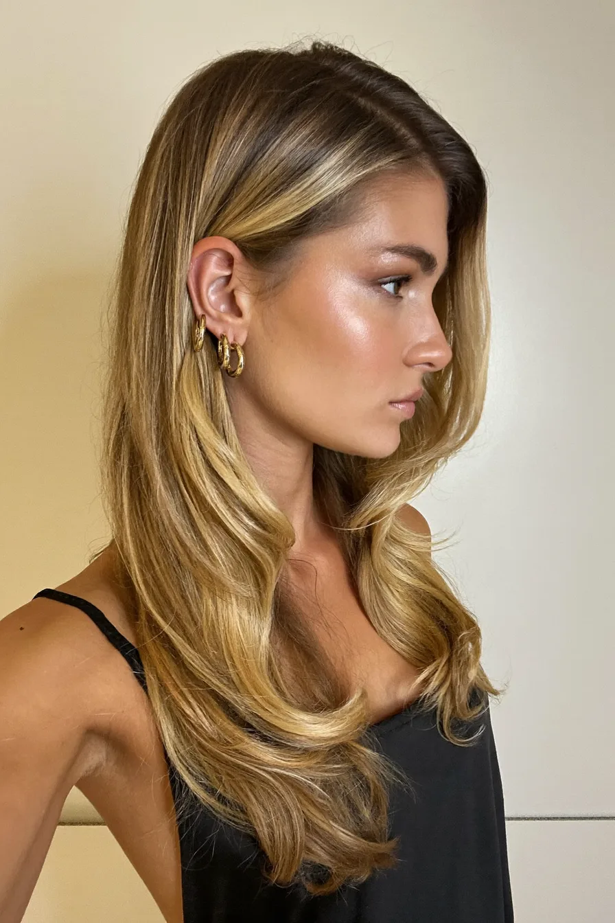 Glossy Wavy Honey Blonde Long Layered Hair with Soft Balayage