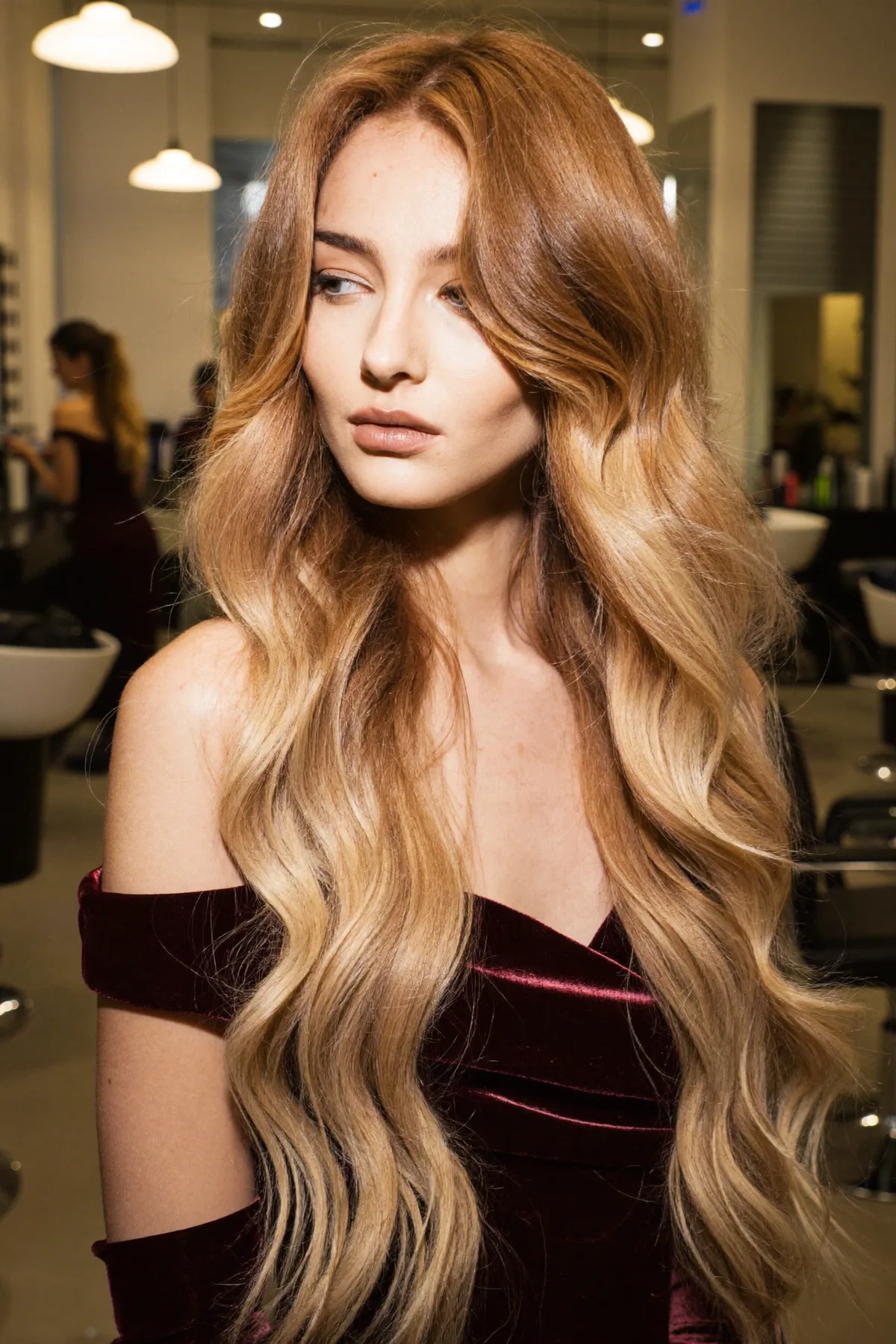 Waist-Length Caramel Bronde Balayage with Long Layers and Curtain Bangs