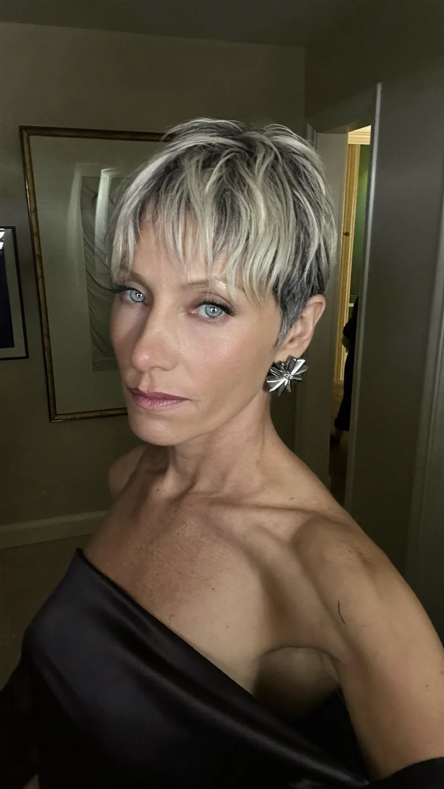 Modern Textured Pixie Cut with Platinum Blonde and Wispy Bangs