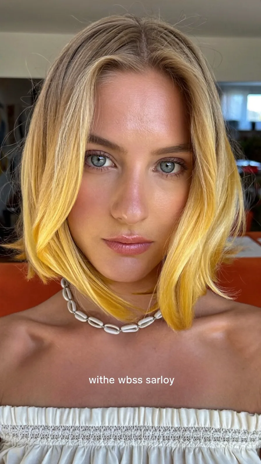 Chin-Length Golden Blonde Blunt Bob with Curtain Bangs