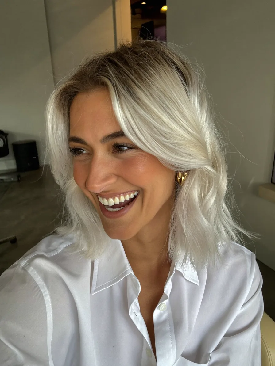 Platinum Blonde Flowing Shoulder-Length Long Layers Hairstyle