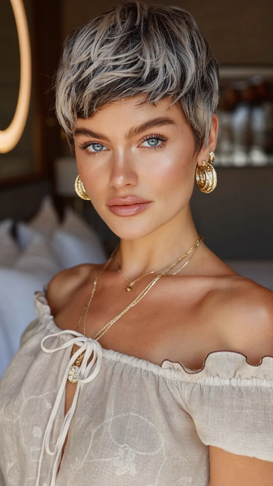 Modern Textured Ash Blonde Pixie with Wispy Bangs