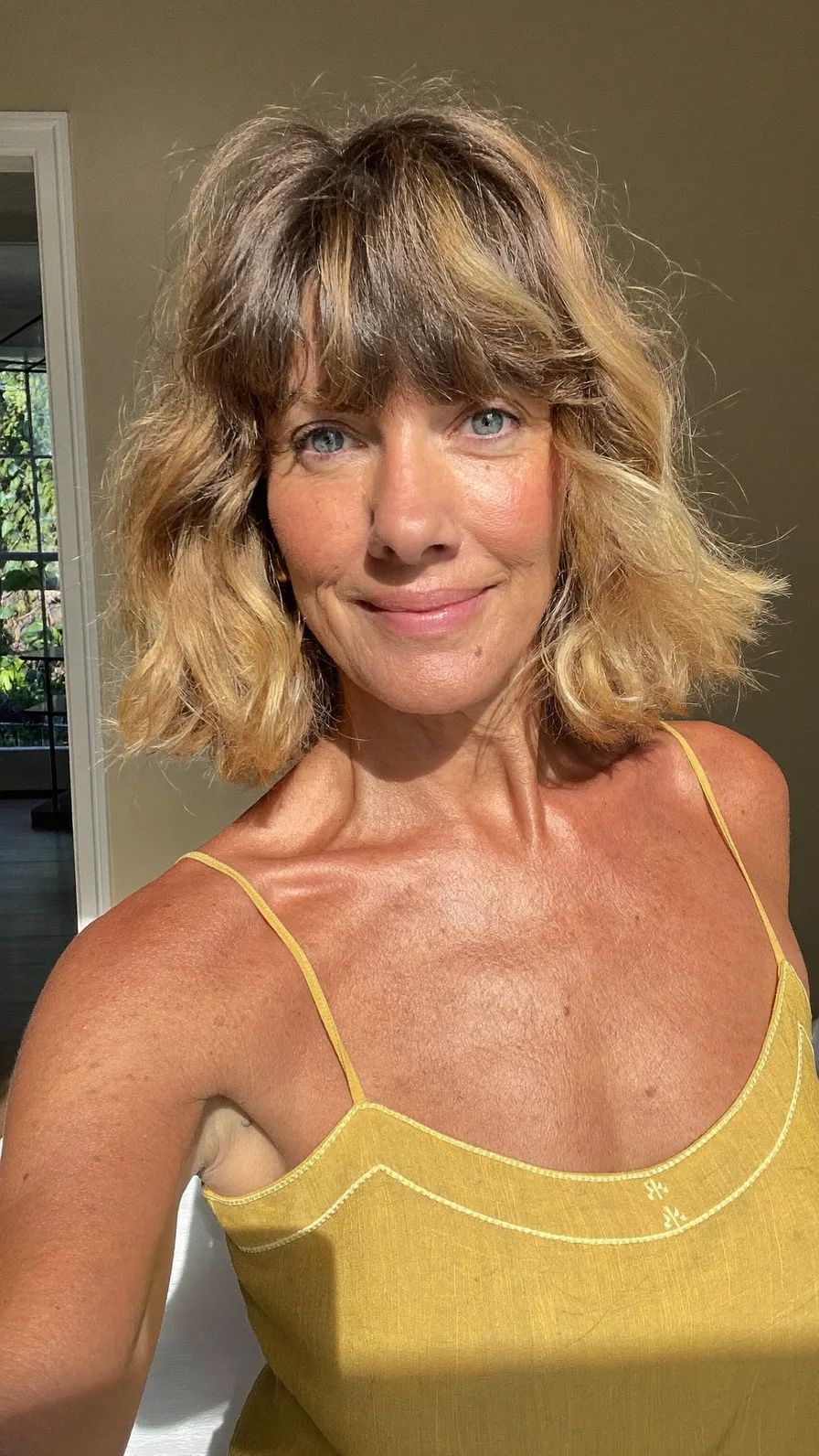 Modern Textured Shag with Curtain Bangs and Balayage Highlights